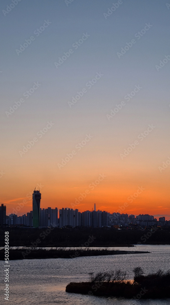 Fototapeta premium sunset over the river
