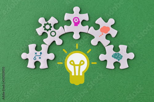 Canvastavla Light bulb with innovation and technology symbols