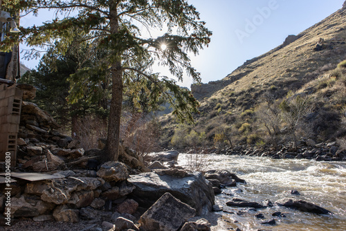 The Poudre River flows next to the Mishawaka Amphitheatre in the Rocky Mountains of Colorado