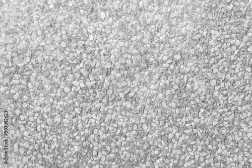 Pebble surface  in hamper seamless patterns decorative on concrete wall on white light grey background photo