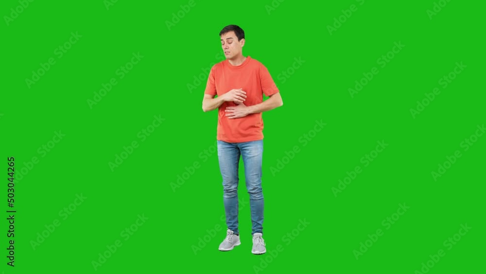 Sick man coughing with closed eyes. Green background Sick man coughing with closed eyes. Green background