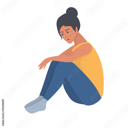The girl is angry and upset. Sits on the floor.