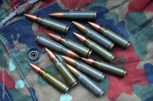 Ammunition 7,62x39 with camo background