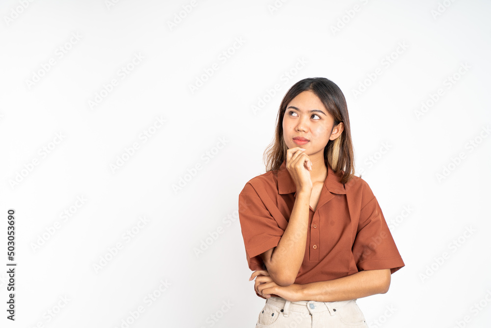 Young asian woman thinking gesture. beautiful woman on isolated background with thoughtful expression Young asian woman thinking gesture. beautiful woman on isolated background with thoughtful expression