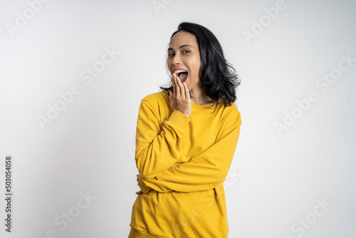 Obraz na plátne portrait of young asian woman feeling shocked and suprised over isolated backgro