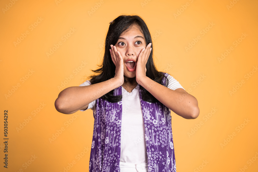 portrait of young asian woman feeling shocked and suprised over isolated background portrait of young asian woman feeling shocked and suprised over isolated background