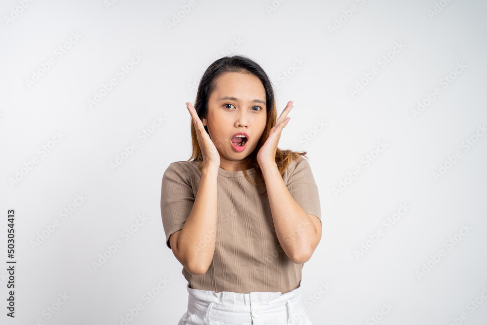 portrait of young asian woman feeling shocked and suprised over isolated background portrait of young asian woman feeling shocked and suprised over isolated background