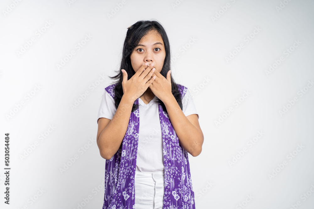 portrait of a asian woman covering her mouth with hands. concept of stop talking portrait of a asian woman covering her mouth with hands. concept of stop talking