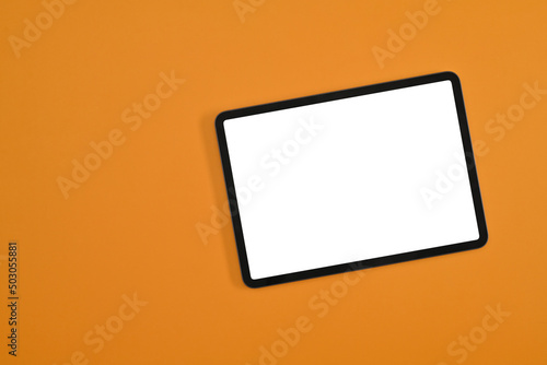 Modern digital tablet mockup on yellow background with blank white screen, Photo mockup with clipping path.