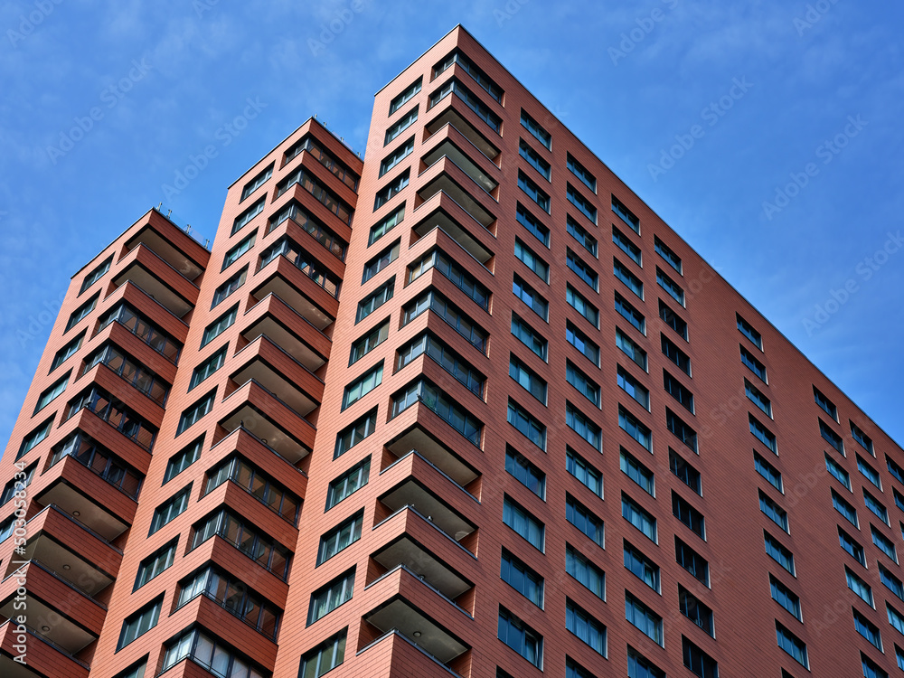 Obraz premium Modern red brick tall house in Bratislava, Slovakia