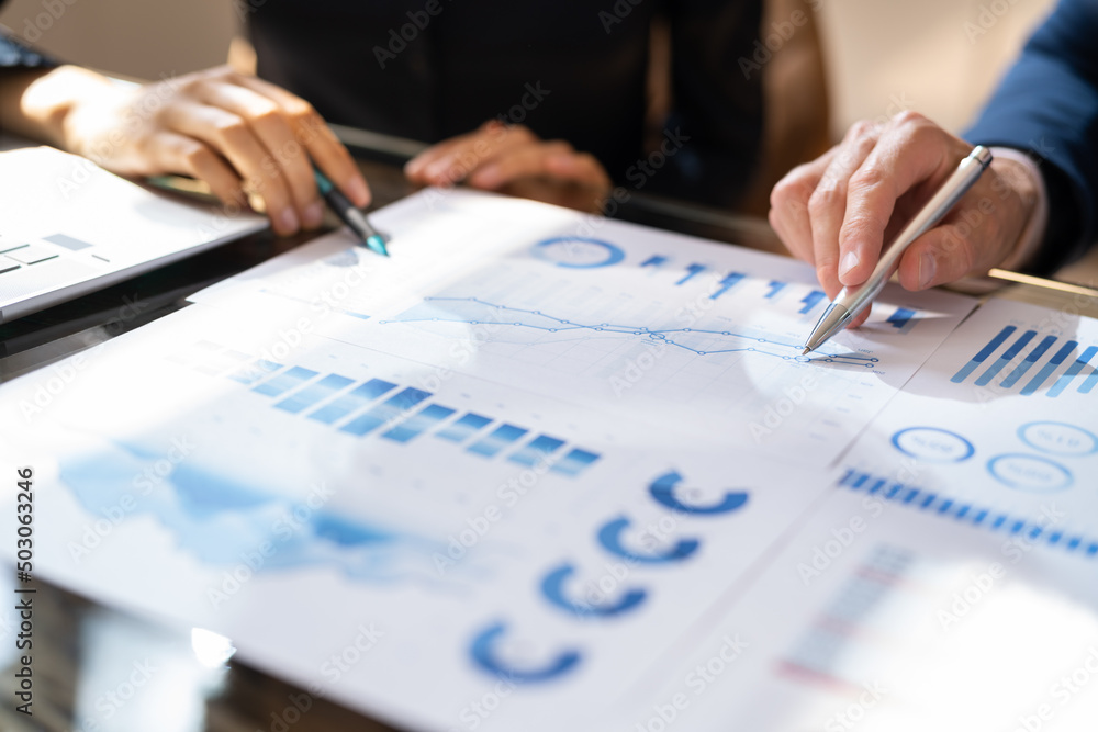 Businesswoman Writing On Graph Businesswoman Writing On Graph