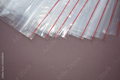 A set of plastic zip bags. Transparent plastic bags on a dark background.