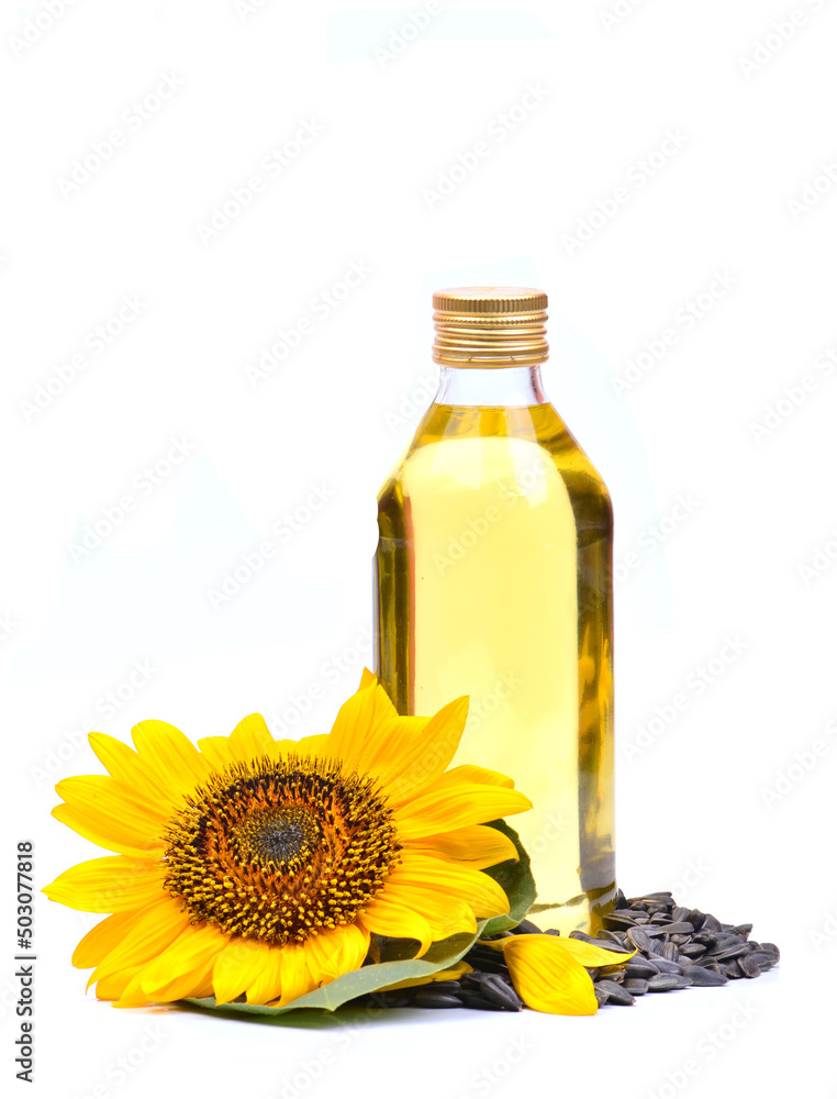 Sunflower with bottle of oil on a white background Sunflower with bottle of oil on a white background