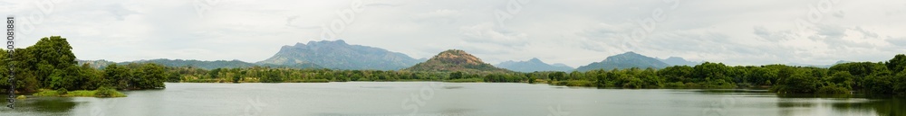 Panaroama of hilly tropical landscape with large lake