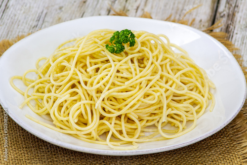 dish of plain cooked spaghetti on a table