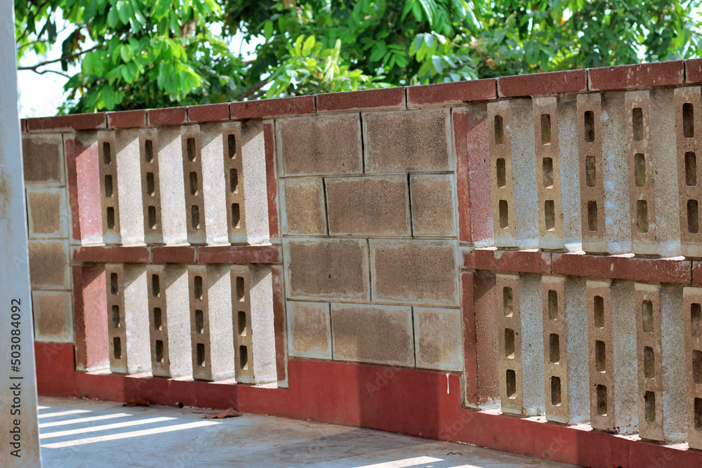 Bright green view of an empty rooftop with concrete railing. Concrete ...