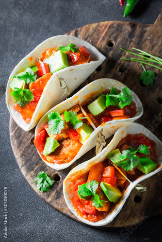 Mexican and spicy tacos as ...