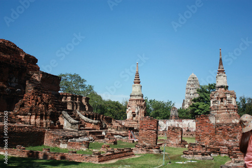 Wat Yai Chaimongkol. ancient buddha Wat Yai Chaimongkol Ayutthaya historical city  Thailand  beautiful blue sky