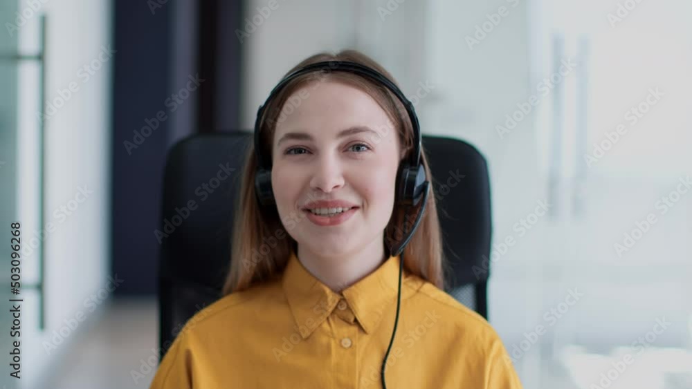 Video chat of helpline. Webcam pov portrait of young woman customer support operator in headset talking to client