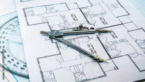 Office blue print with drawing compass and ruler