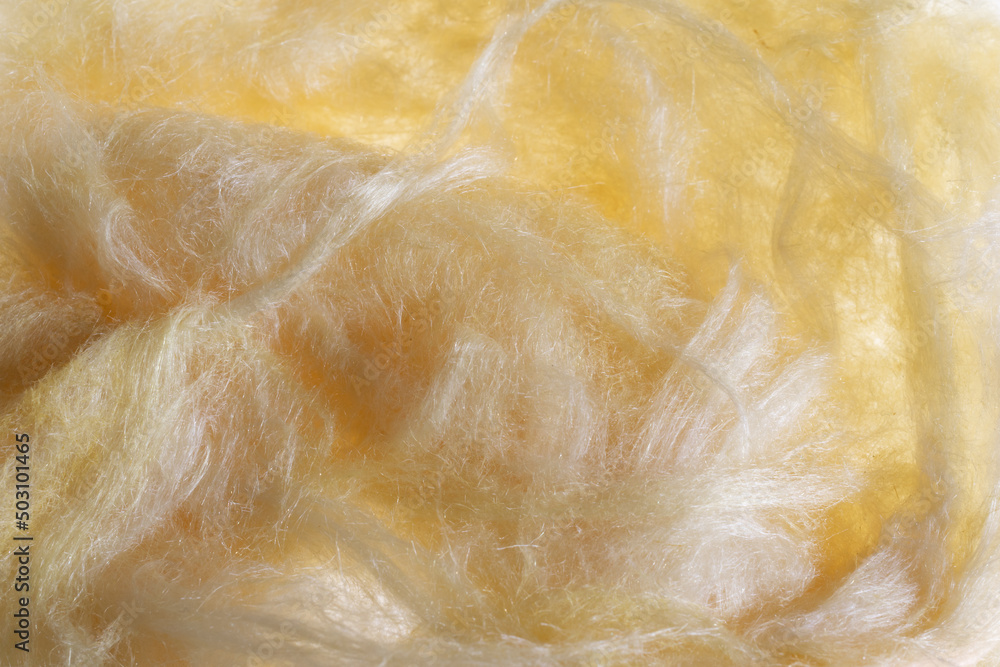 yellow mineral wool with a visible texture
