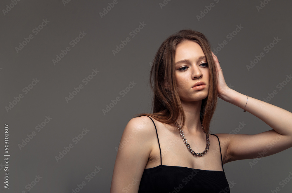 Need to think. Serious young woman while being deep in thoughts about her problems and family quarrels Need to think. Serious young woman while being deep in thoughts about her problems and family quarrels