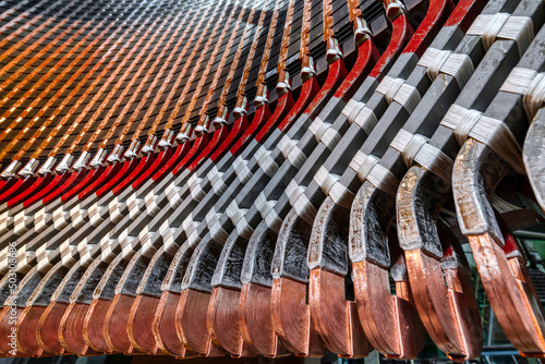 Group of colorful metal details of electric motor at plant