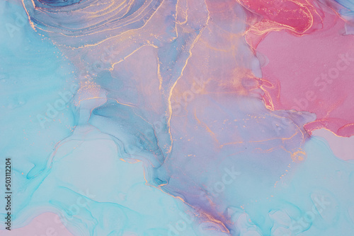 Abstract liquid ink painting background in pink blue colors.