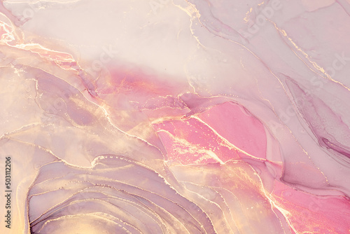 Abstract liquid ink painting background in pink colors with golden splashes.