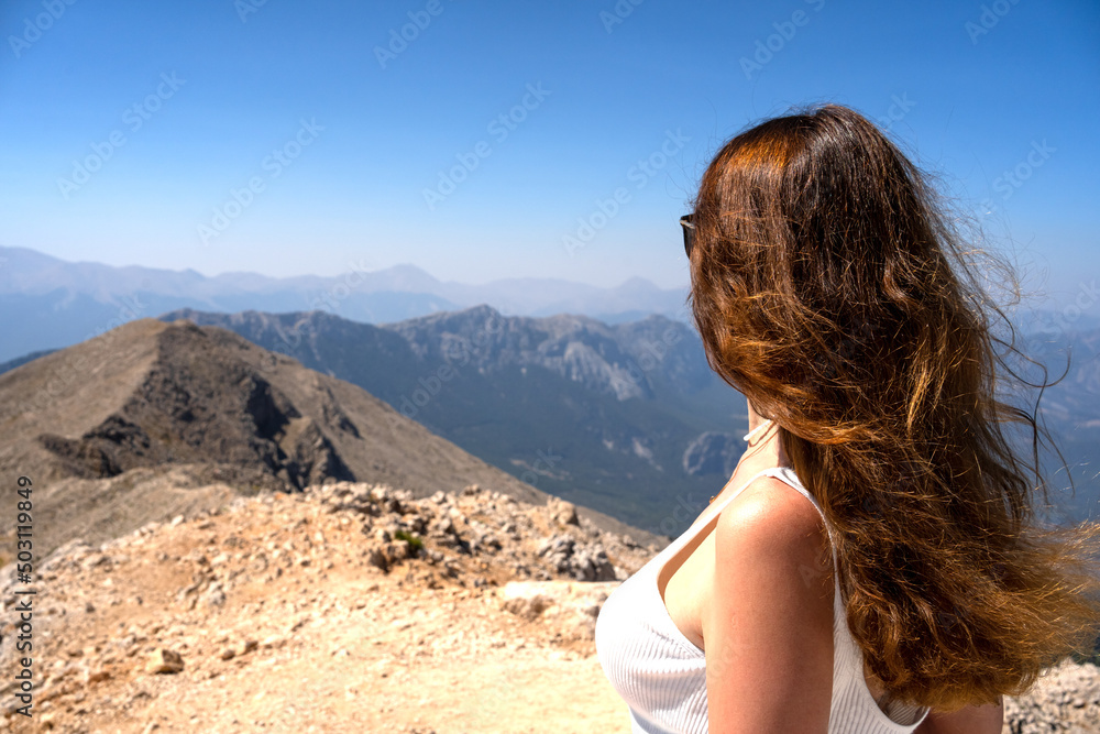 Girl looking at the mountains