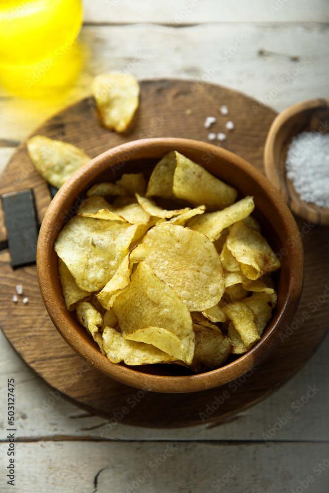 Homemade potato chips with sea salt Homemade potato chips with sea salt