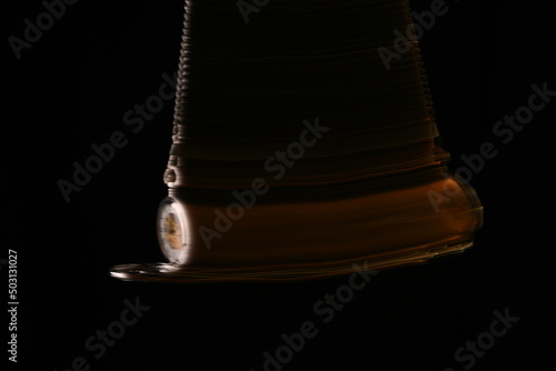 motion of pocket watch swinging from chain representing innovation in time