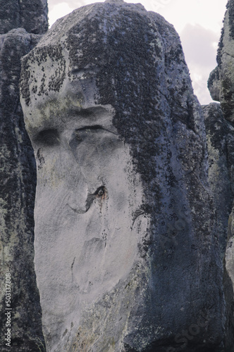 Εκτύπωση καμβά Vertical closeup of a big textured grey memorial rock megalith