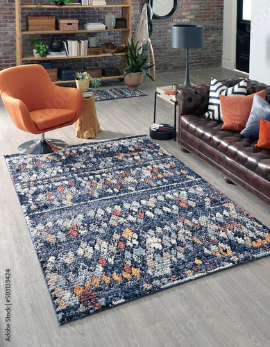 Modern living room area rug design. Interior room rug sofa chair carpet wall design.