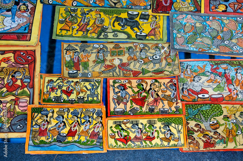 KOLKATA  WEST BENGAL   INDIA - JANUARY 12TH 2014   Paintings   Artworks of handicraft  on display during the Handicraft Fair in Kolkata - the biggest handicrafts fair in Asia.