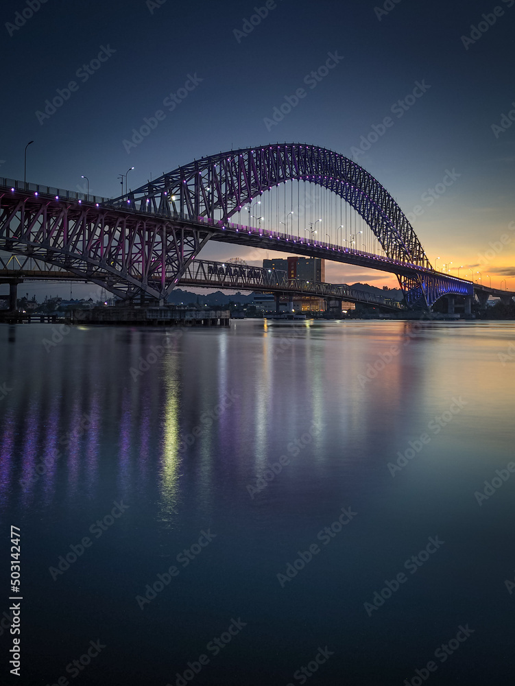 a Mahakam bridge in sunset day