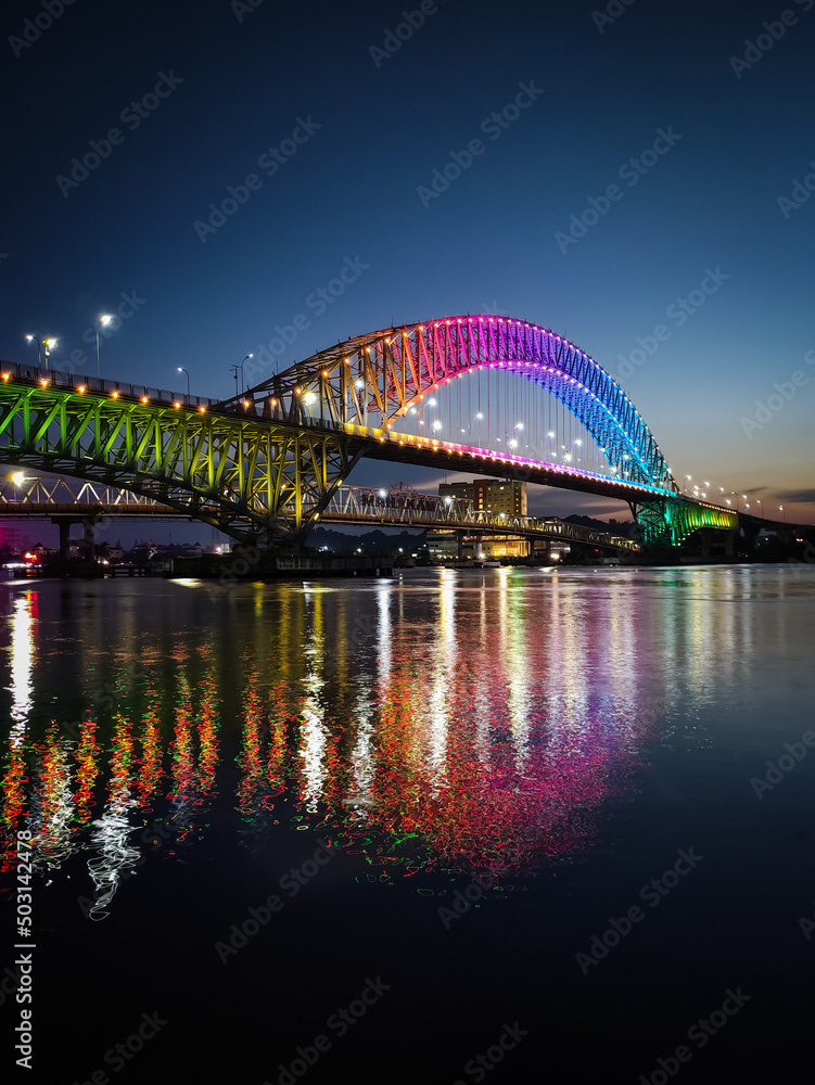 Rainbow bridges begin to decorate the Mahakam River in Samarinda