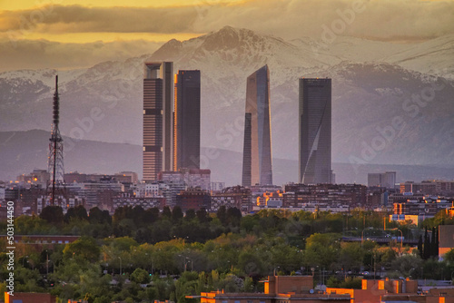 Cityscape view of Cuatro Torres Business Area, a district in Madrid, Spain, at sunset photo