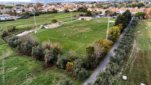Aerial view of amateur football match in Tuscany photo