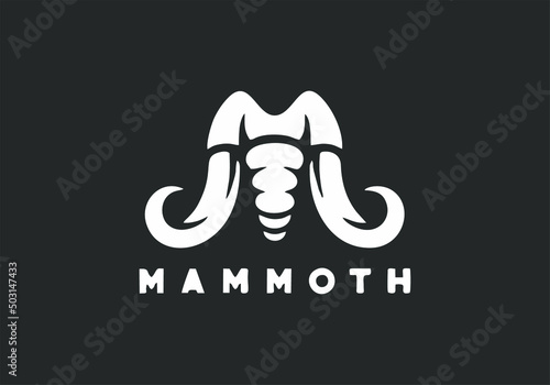 Vector illustration of a mammoth logo in grey and white colors photo