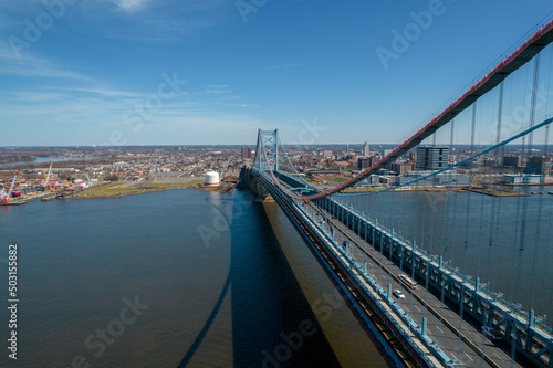 Aerial Drone View of Philadelphia on a Clear Sunny Day with Bridge Over a River in Foreground