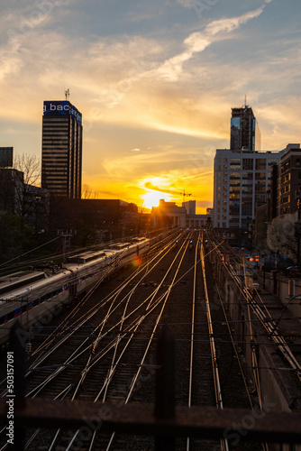 View of Train on Railway at Sunset