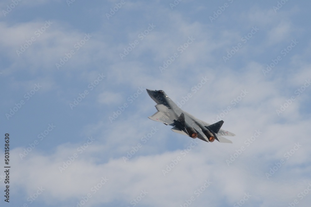 Obraz premium The Russian multi-purpose fighter of the fifth generation Su-57 at the International Aviation and Space Salon MAKS-2021 in Zhukovsky