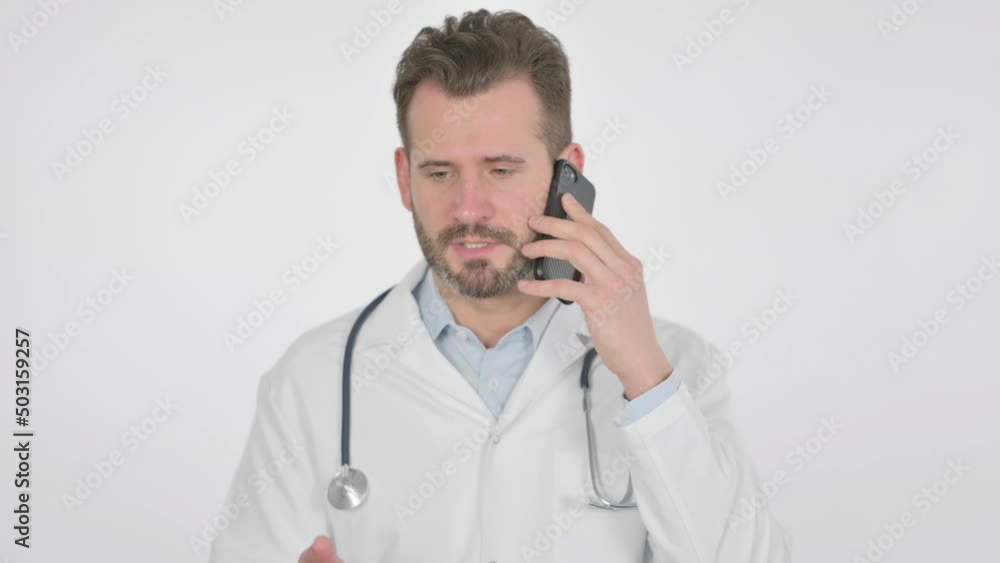 Portrait of Middle Aged Doctor Talking on Smartphone Portrait of Middle Aged Doctor Talking on Smartphone