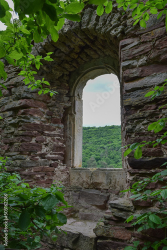 ruins of an ancient castle. Arched window. Western Ukraine