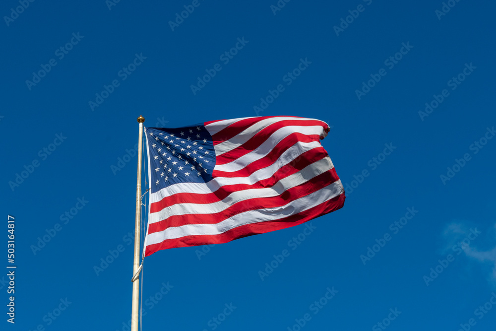 american flag on sky waving in the wind american flag on sky waving in the wind