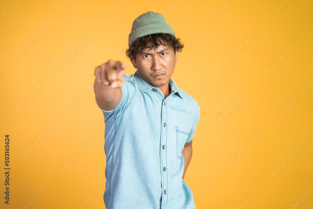 angry man with finger pointing on someone isolated background angry man with finger pointing on someone isolated background