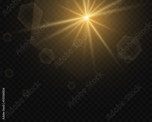 Bright sunbeams of light, flash of light with glare and reflection of light on a transparent background