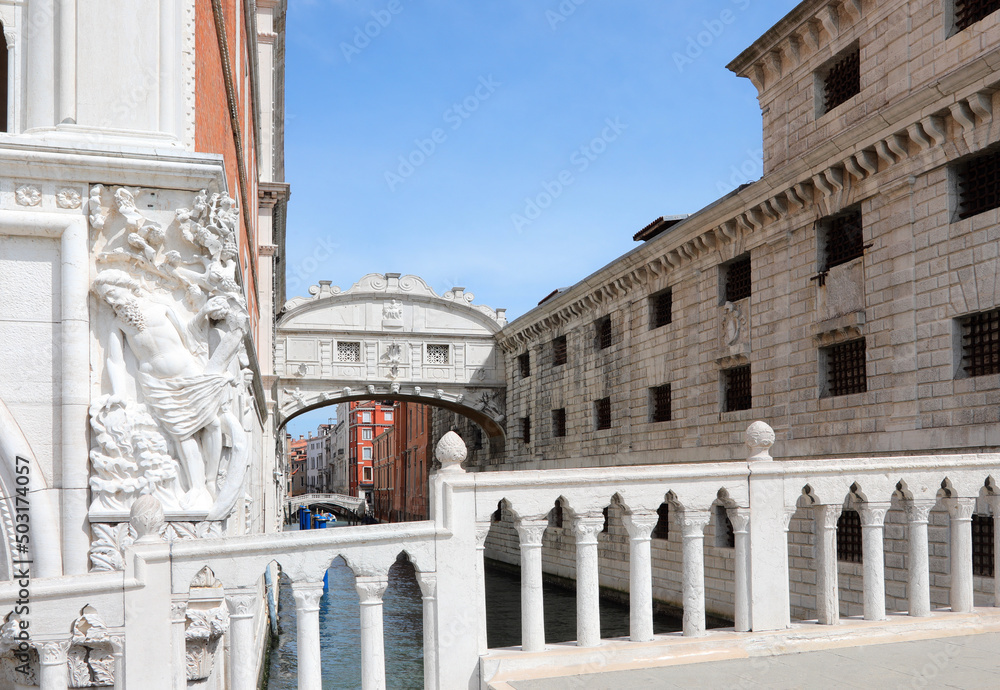 Venice, VE, Italy - May 18, 2020:. Statue of Drunken Noah from the Facade of Ducal Palace and the bridge of sighs