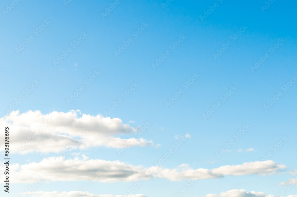 Obraz premium Beautiful blue sky with white clouds, clear sky on a sunny day